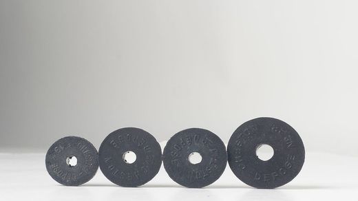 Small round rubber bumper with central hole in black Cheston